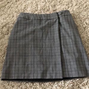 Checkered wrap style skirt.